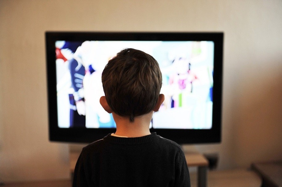 Preschooler at the TV screen